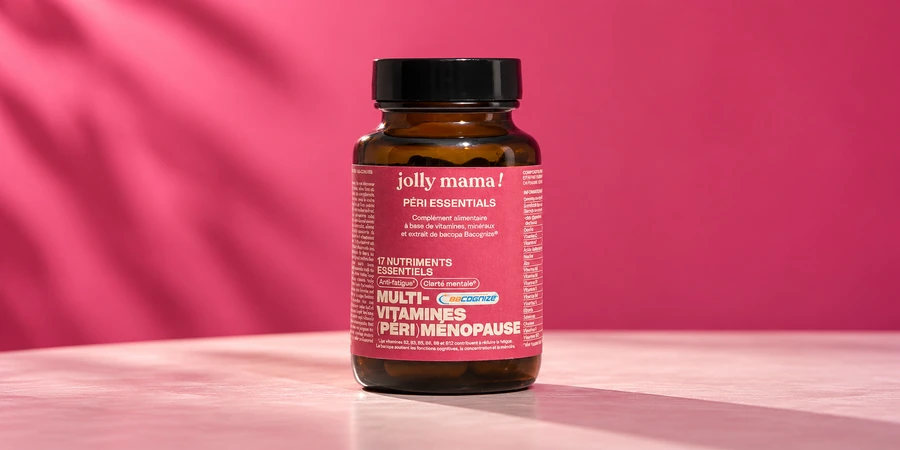 Pot ambré Péri essentials de Jolly Mama à étiquette rose, couvercle fermé, sur une table claire